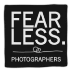 Fearless Photographers logo in white on black background, green outline frame and text “FEAR LESS. Photographers”.